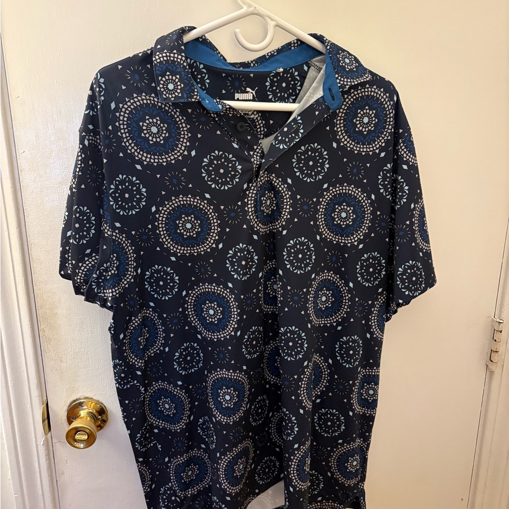 Puma Blue Polo Shirt with Artistic Patterns